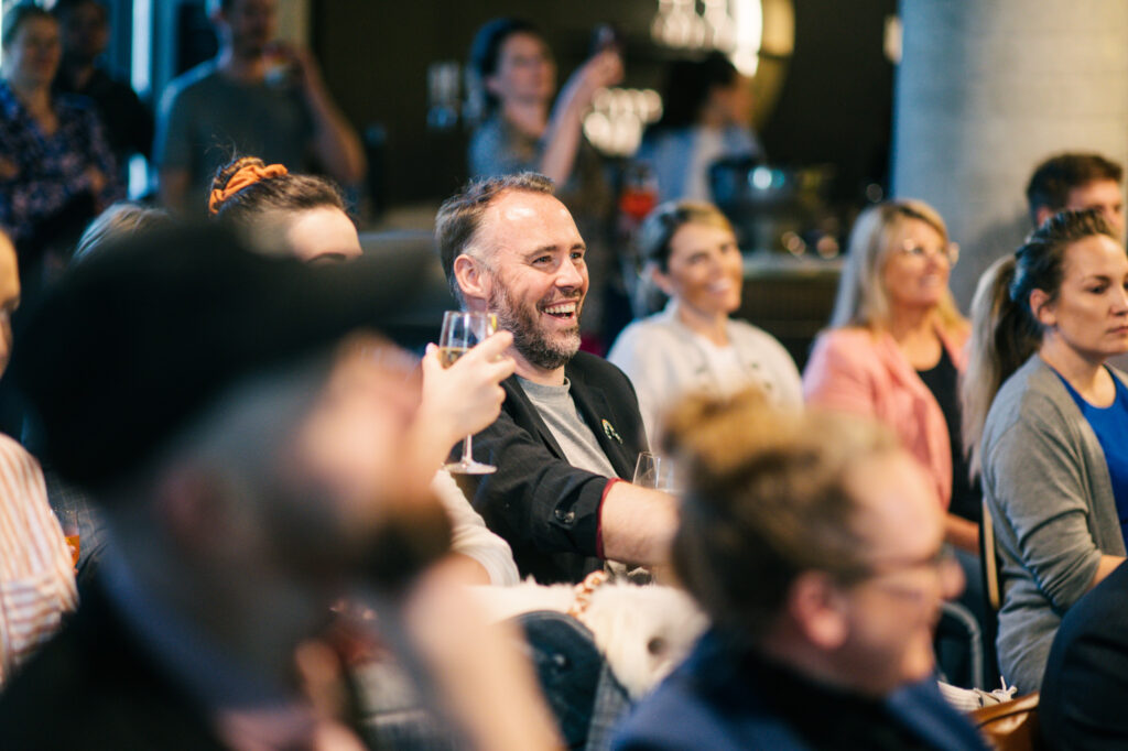 Modern coworking space in Australia with people collaborating in a vibrant open-plan office
