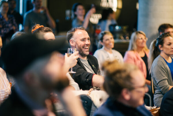 Modern coworking space in Australia with people collaborating in a vibrant open-plan office