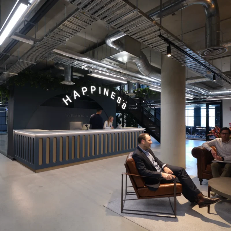 Reception area at CreativeCubes.Co highlighting the Happiness Team supporting Sydney’s coworking growth