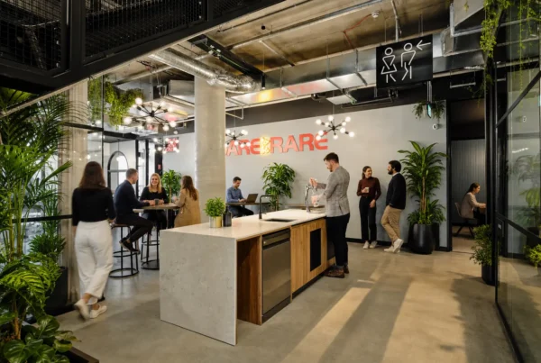 Professionals collaborating inside a modern coworking space in Australia