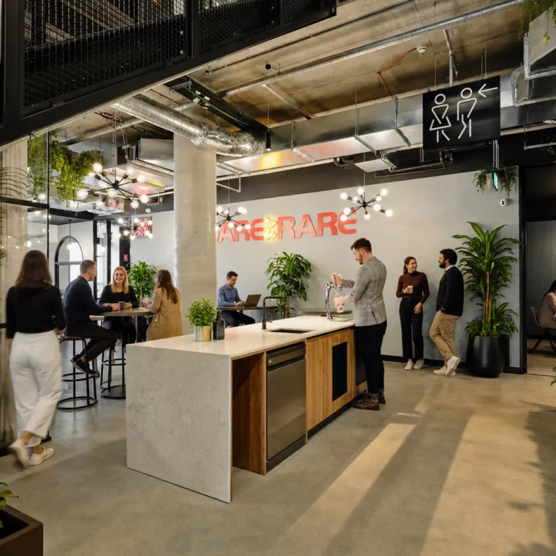 Professionals collaborating inside a modern coworking space in Australia