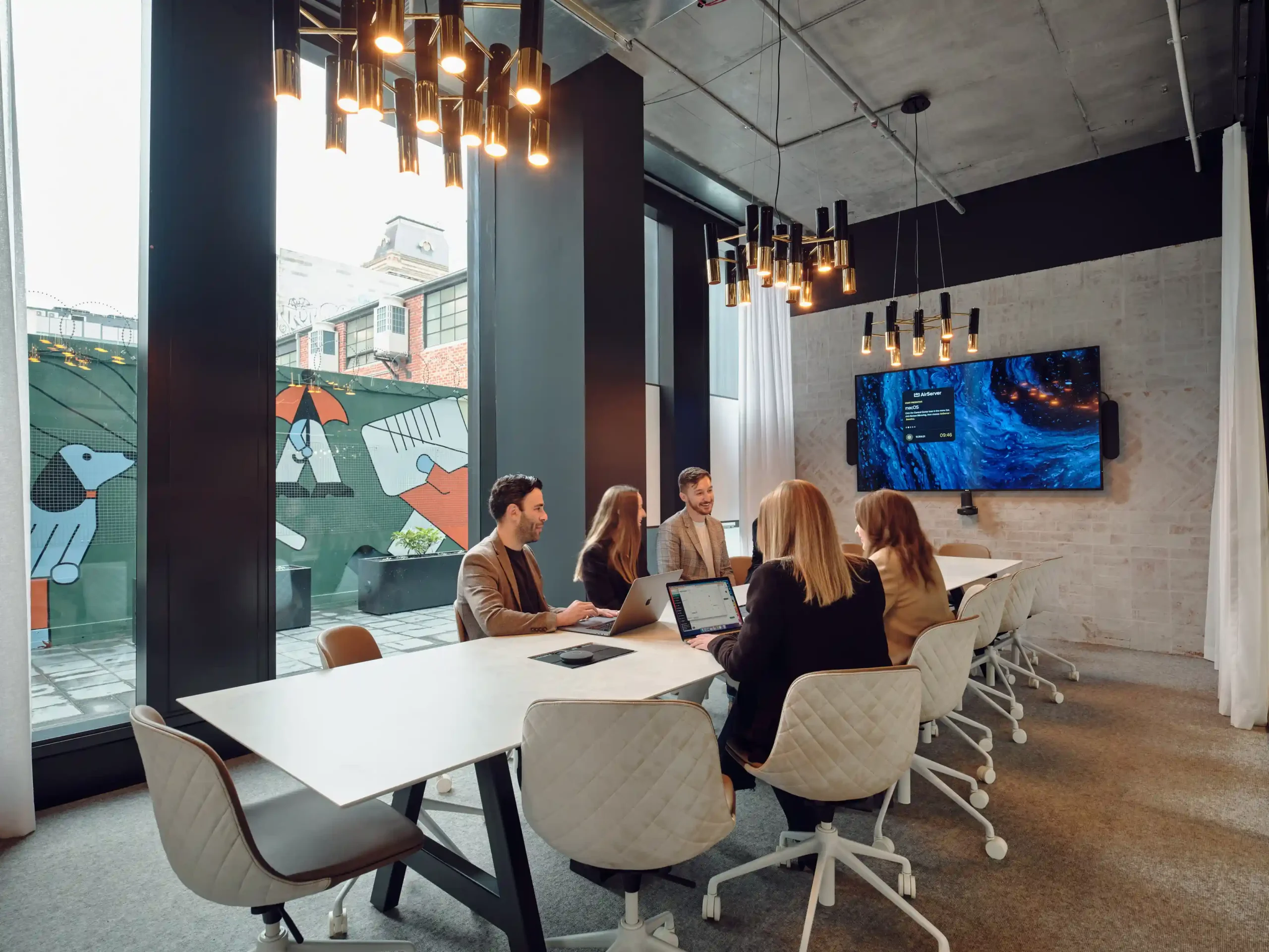 Creative team collaborating inside a serviced private office