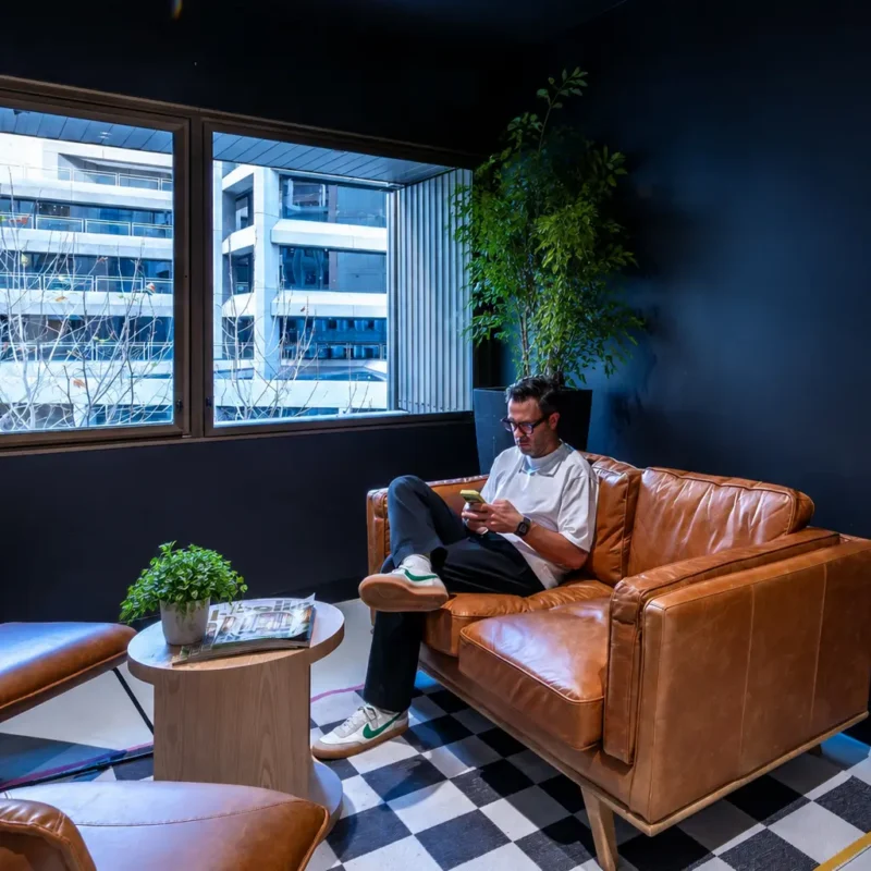 Professionals collaborating in a flexible CreativeCubes.Co workspace designed to improve employee engagement and staff retention